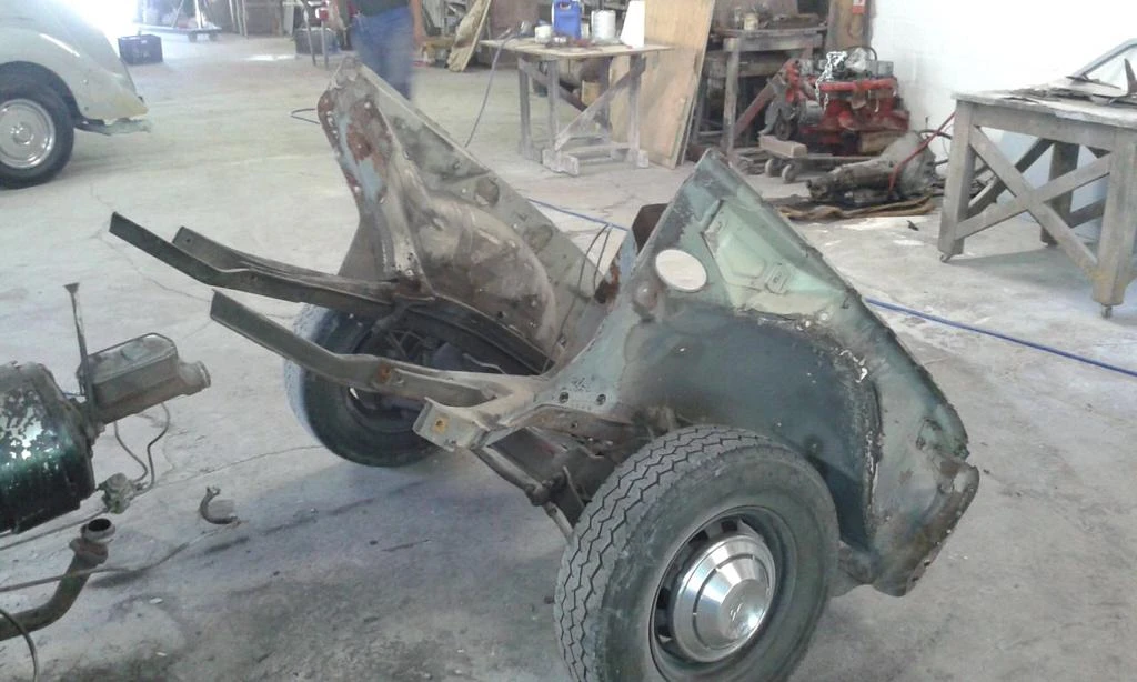 The front chassis, suspension and inner structure visible with the outer panels removed.