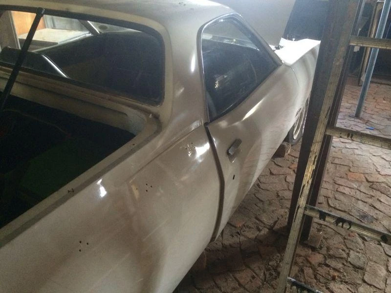 A view of the cab and rear quarter documenting the body condition at this stage.